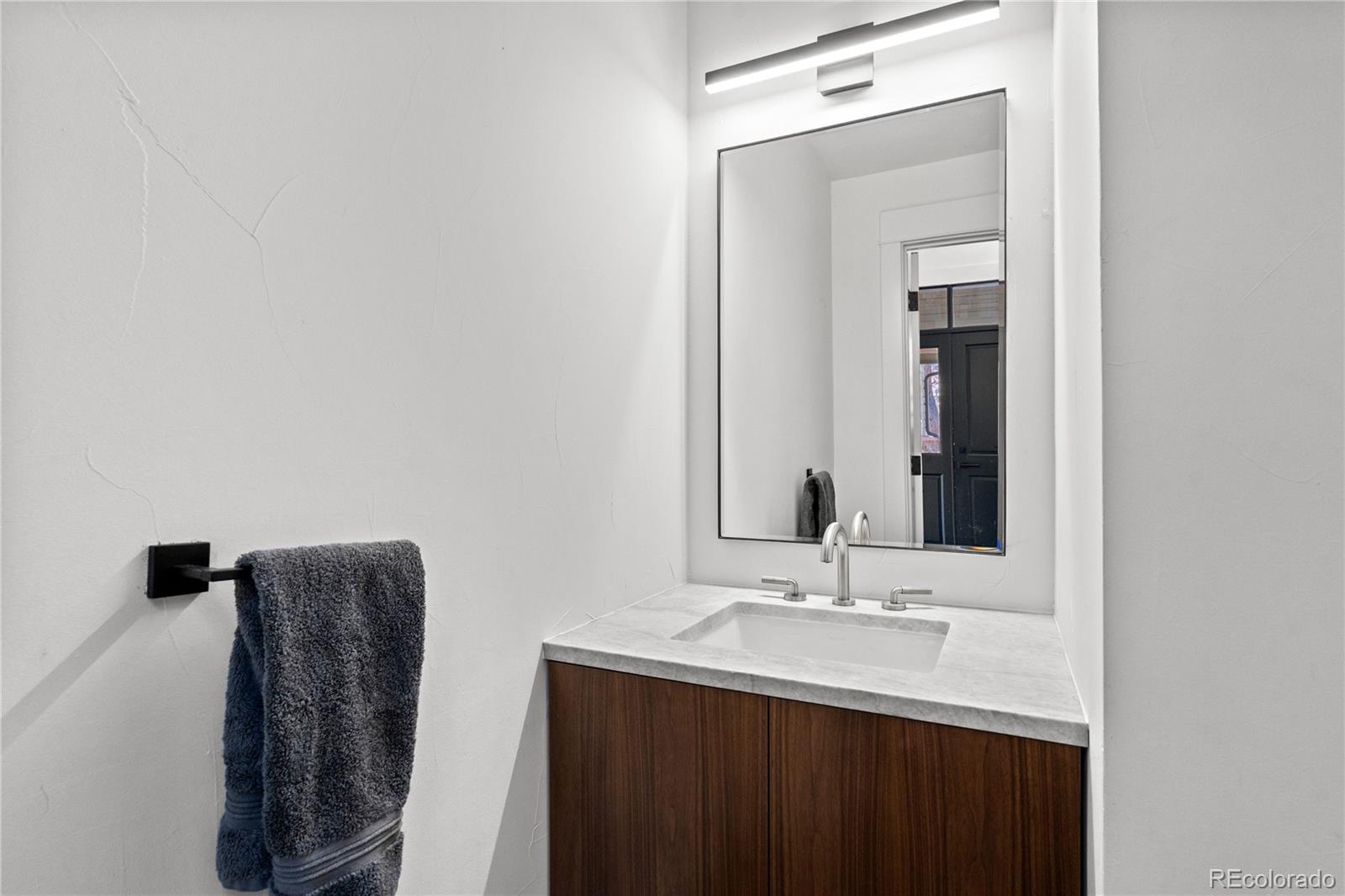 14 Pine Brook Road Boulder, CO 80304 - Photo 19 of 49 a bathroom with a sink and a mirror