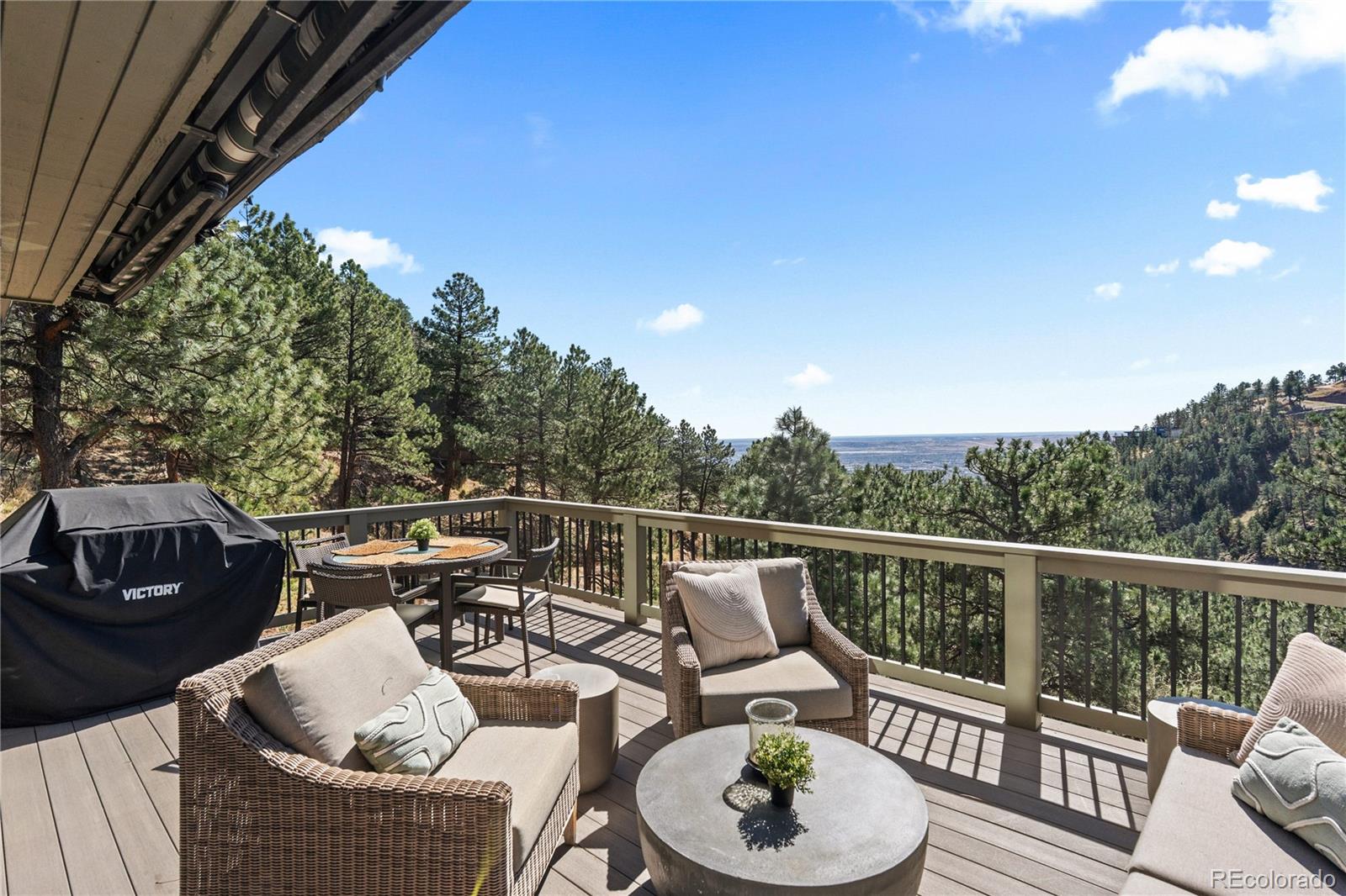 14 Pine Brook Road Boulder, CO 80304 - Photo 21 of 49 a balcony with table and chairs