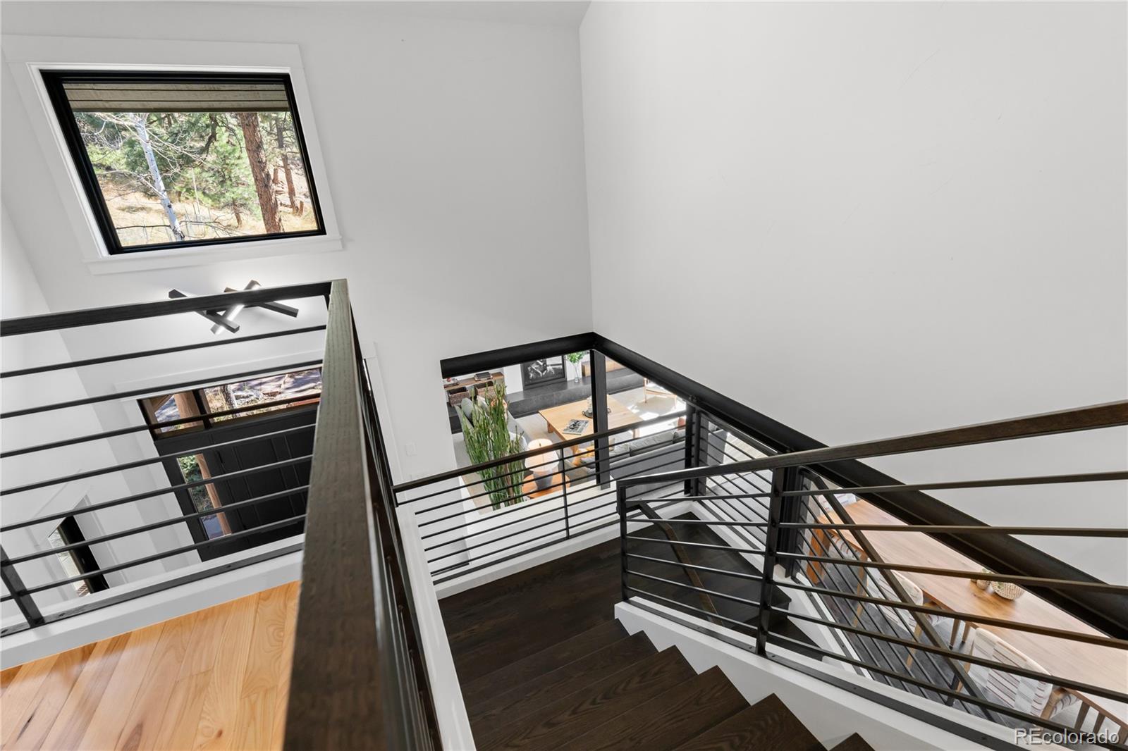 14 Pine Brook Road Boulder, CO 80304 - Photo 23 of 49 a view of entryway and hall with wooden floor