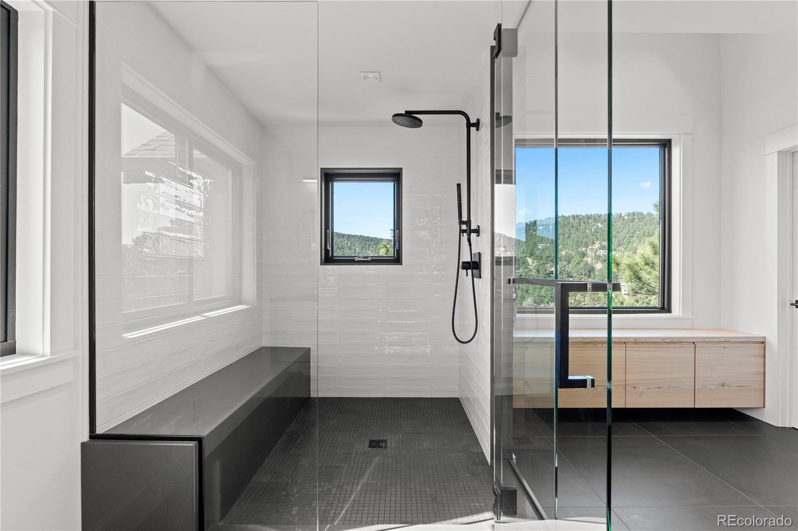 14 Pine Brook Road Boulder, CO 80304 - Photo 29 of 49 a bathroom with a tub and shower