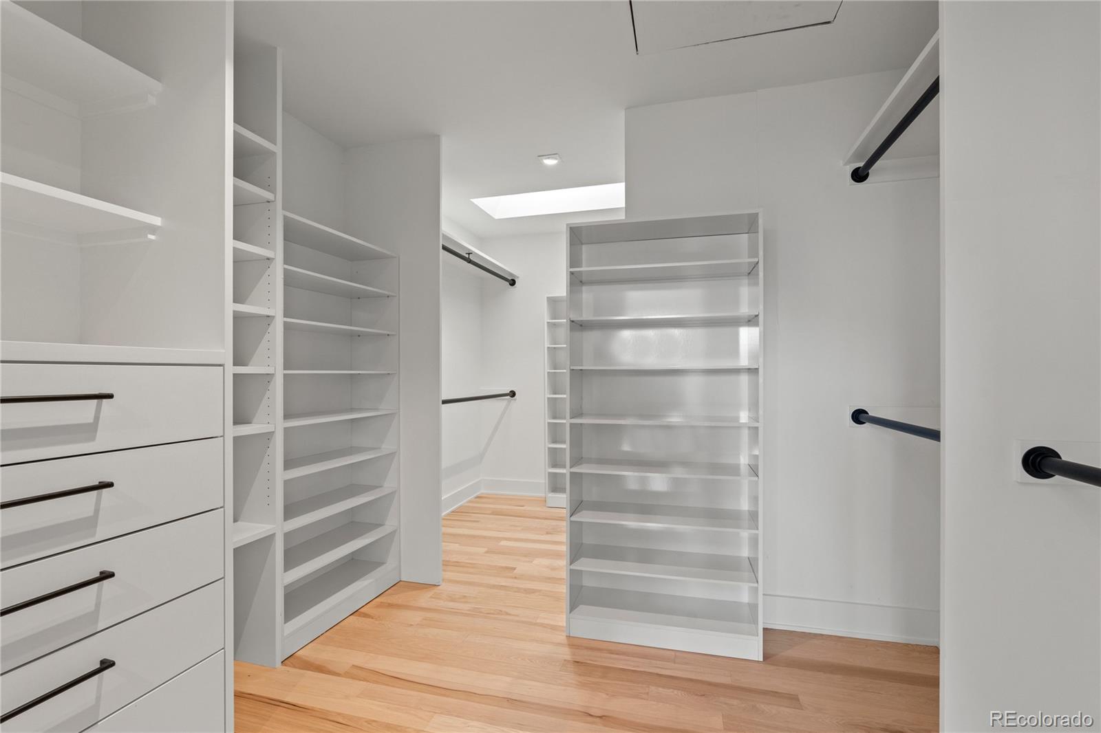 14 Pine Brook Road Boulder, CO 80304 - Photo 30 of 49 a view of walk in closet with empty racks