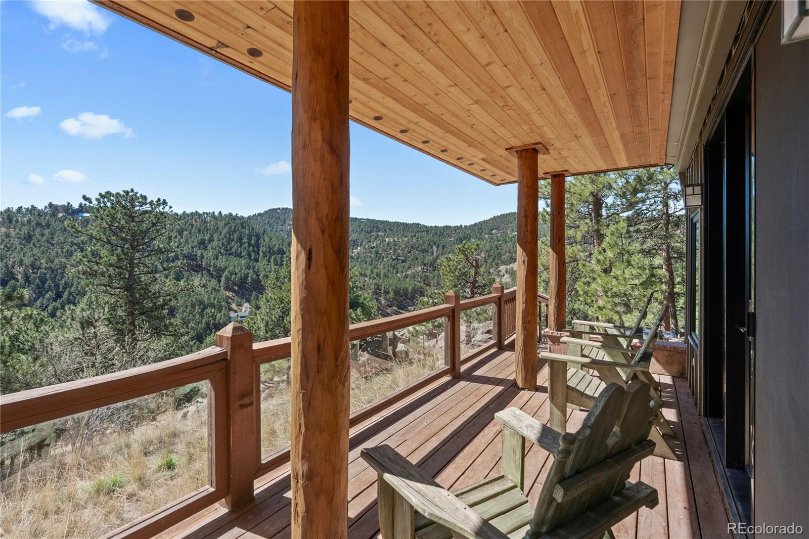 14 Pine Brook Road Boulder, CO 80304 - Photo 40 of 49 a view of a two chair in the balcony