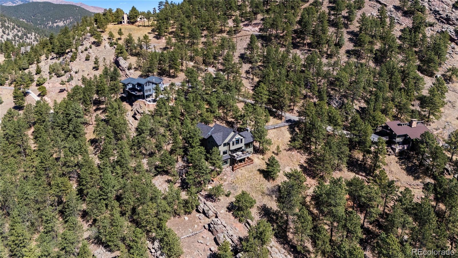 14 Pine Brook Road Boulder, CO 80304 - Photo 46 of 49 an aerial view of residential houses with outdoor space and trees