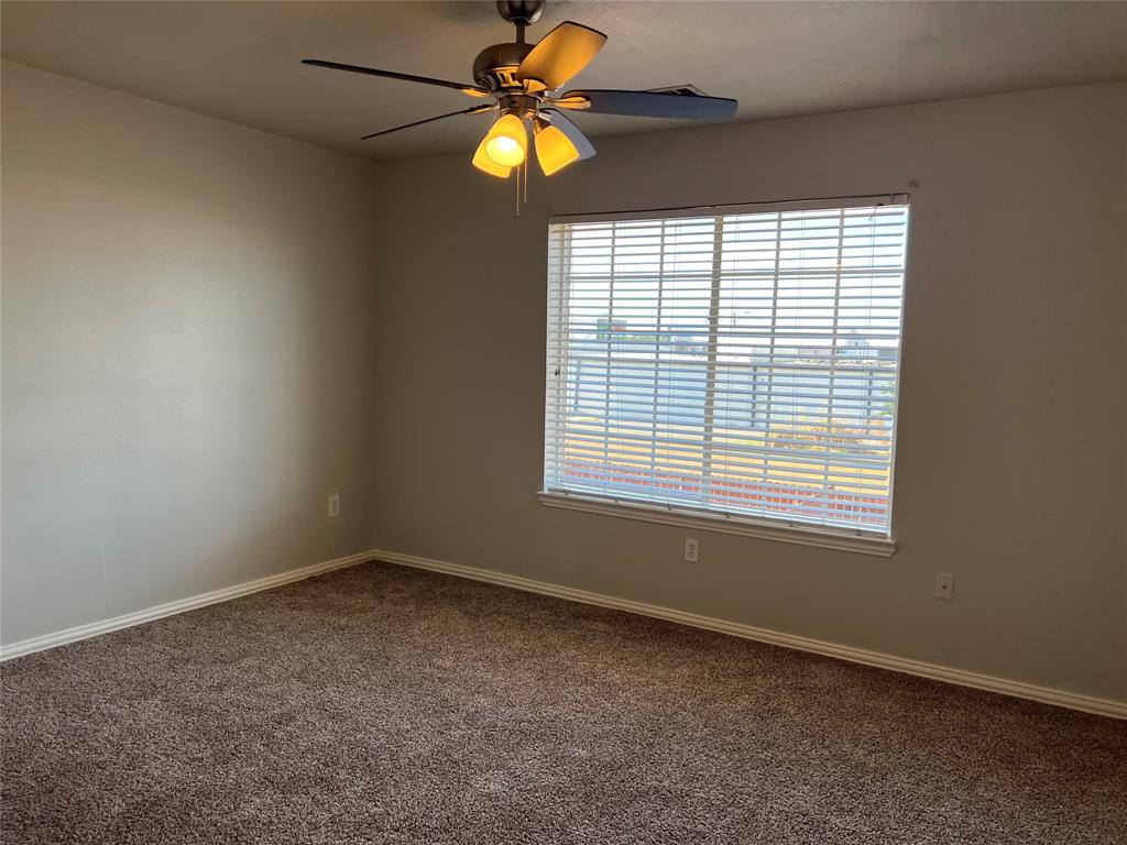 4027 Preferred Place Dallas, TX 75237 - Photo 24 of 27 a view of an empty room with a window