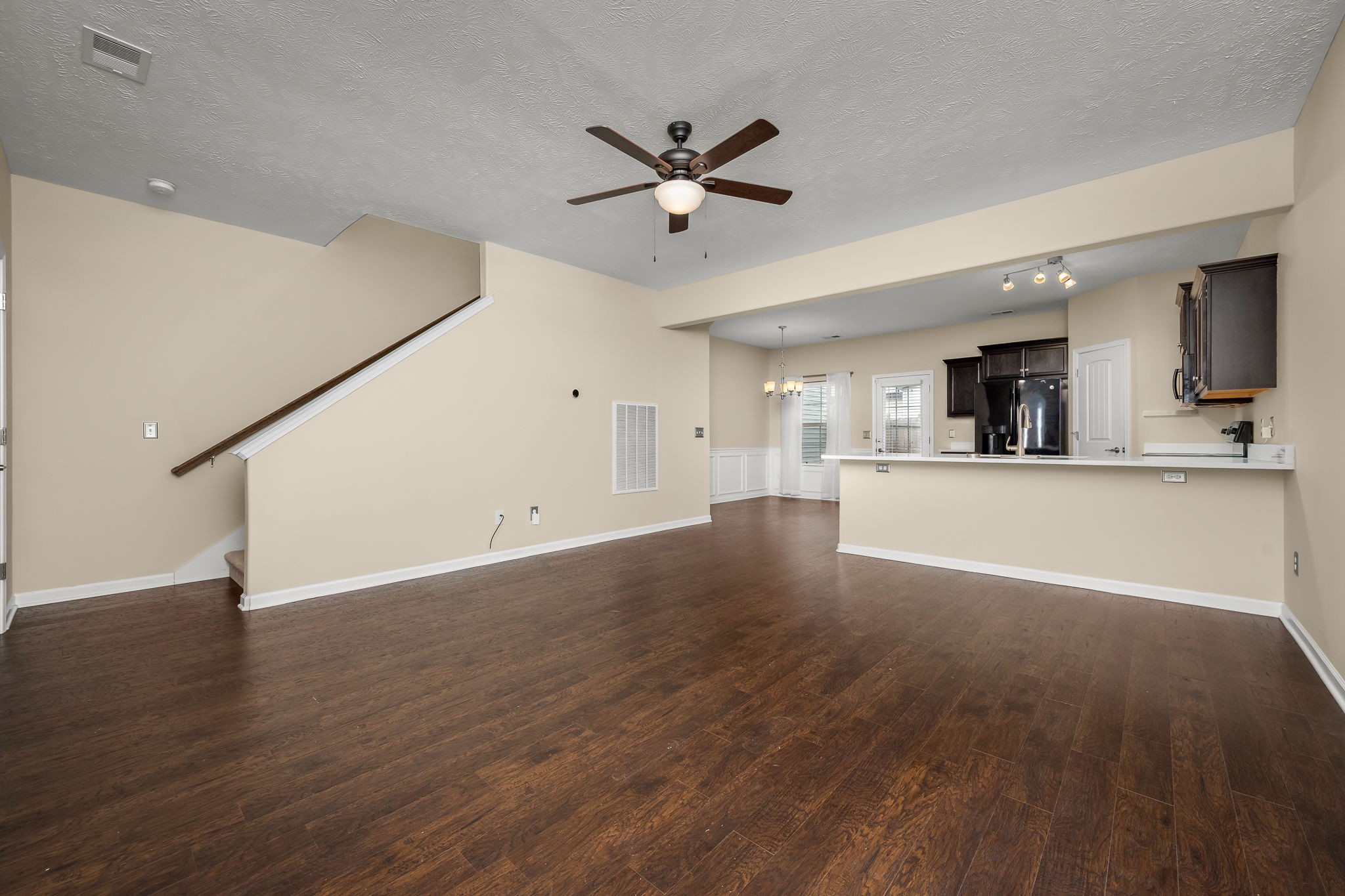 5322 Dan Post Way Murfreesboro, TN 37128 - Photo 11 of 39 a view of a kitchen with wooden floor and a ceiling fan
