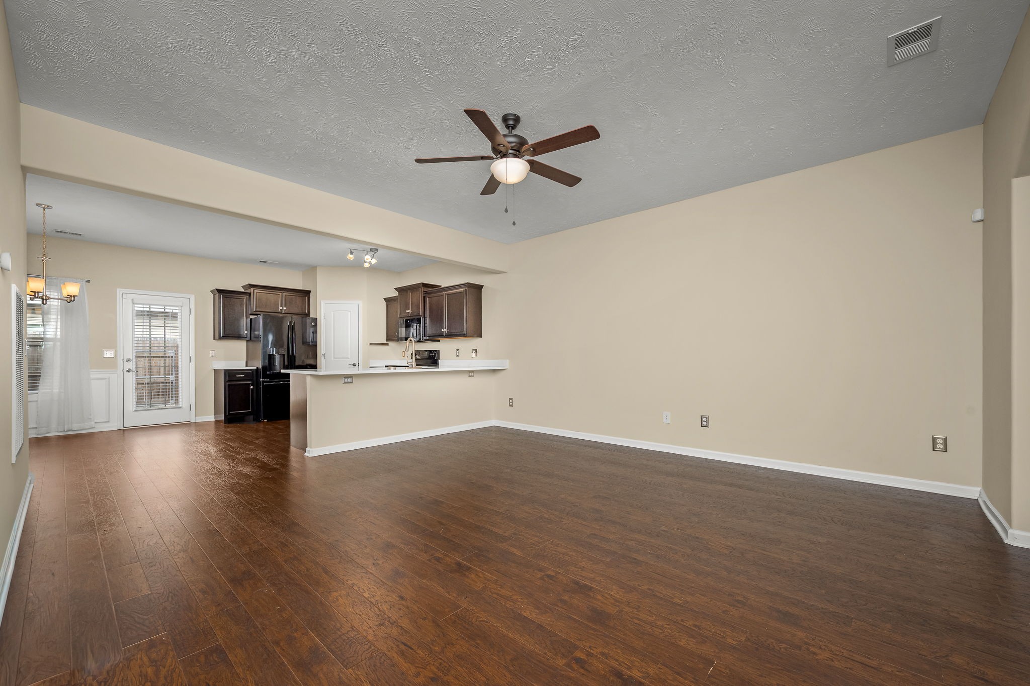 5322 Dan Post Way Murfreesboro, TN 37128 - Photo 14 of 39 a view of a kitchen with wooden floor and a kitchen