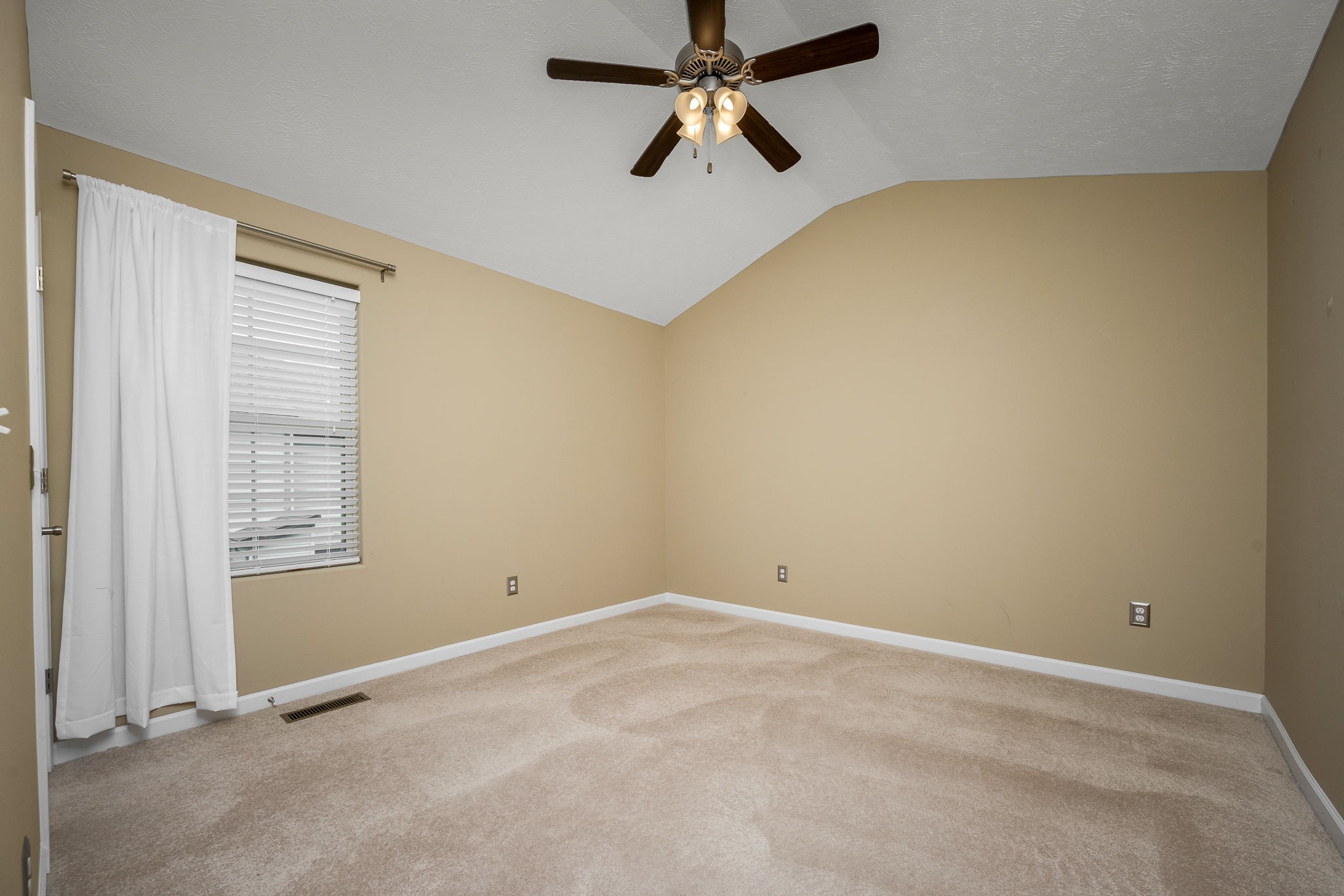5322 Dan Post Way Murfreesboro, TN 37128 - Photo 28 of 39 an empty room with windows and fan