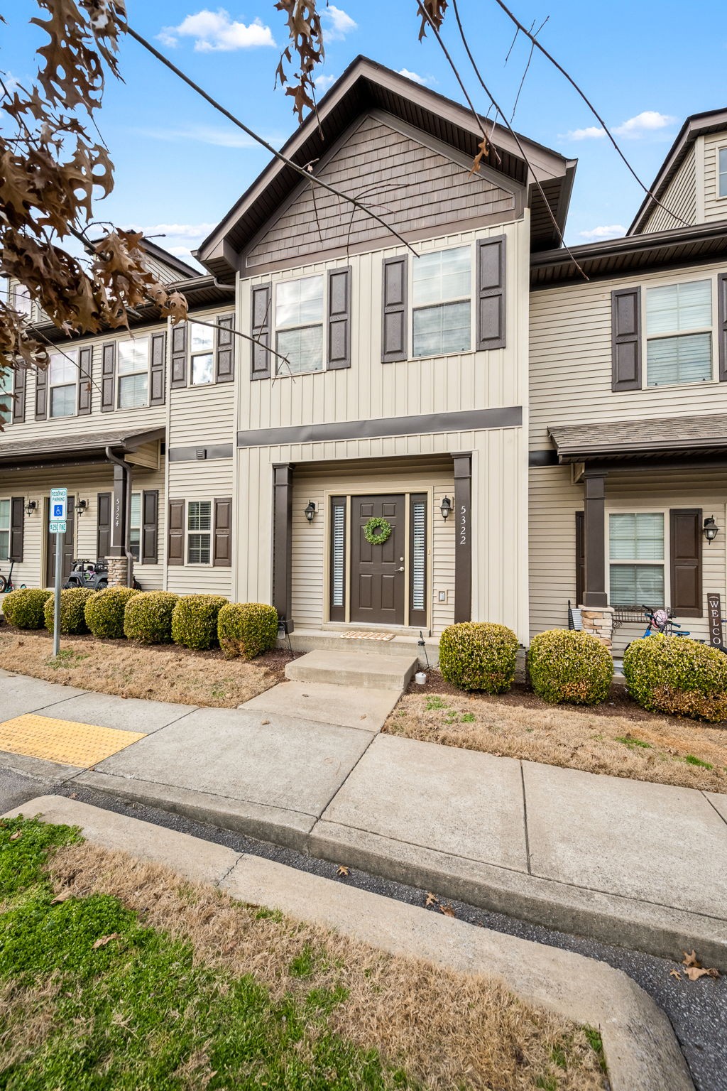 5322 Dan Post Way Murfreesboro, TN 37128 - Photo 9 of 39 a front view of a house with yard and parking