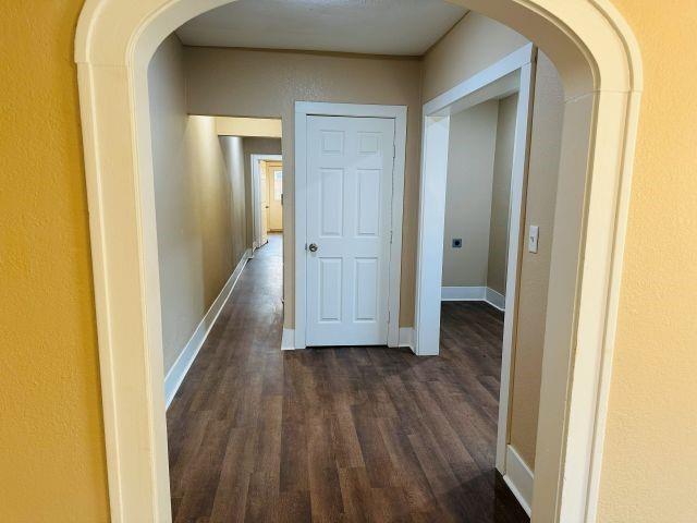 1423 East Elm Street Tyler, TX 75702 - Photo 7 of 15 a view of a hallway with wooden floor
