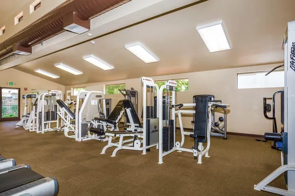a view of a room with gym equipment