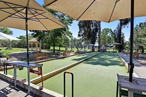 a view of a yard with sitting area