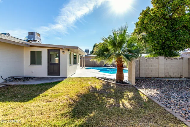 a house view with a swimming pool