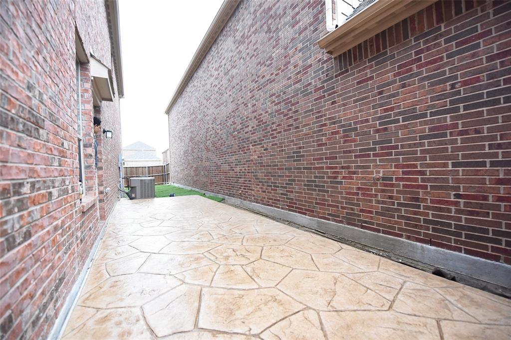 855 Llano Drive Allen, TX 75013 - Photo 19 of 20 a view of brick walls of the building