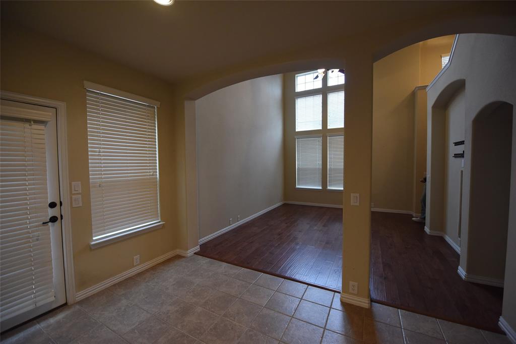 855 Llano Drive Allen, TX 75013 - Photo 8 of 20 an empty room with windows