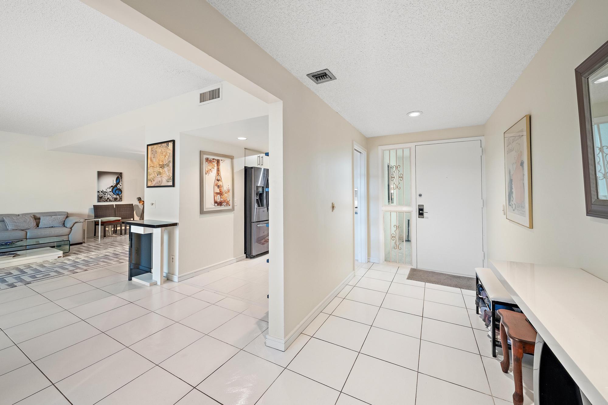 3970 North Ocean Drive, Unit 6 Singer Island, FL 33404 - Photo 23 of 55 Foyer
