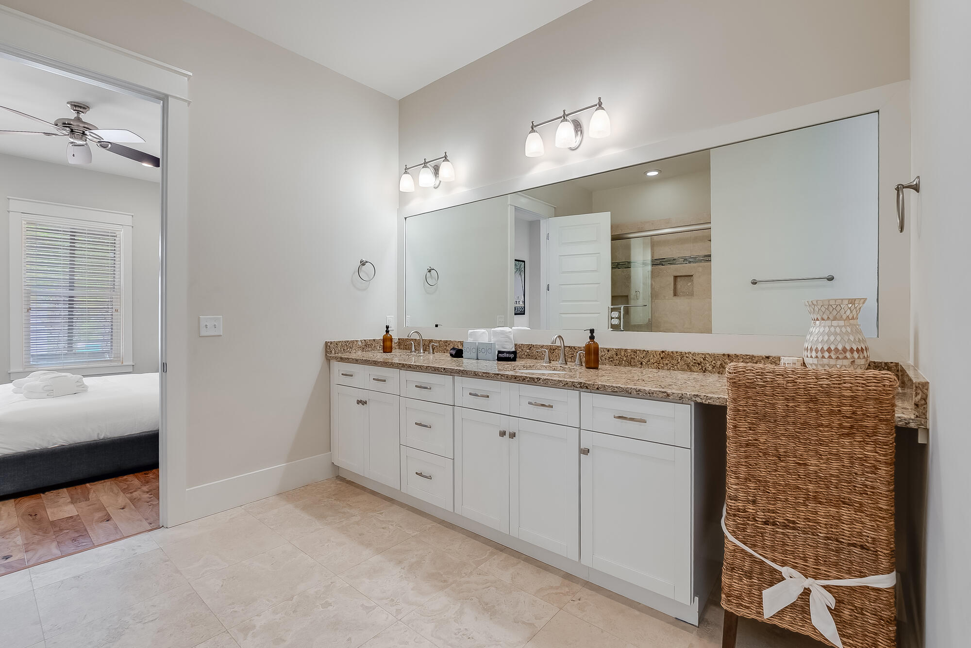 45 Pine Knoll Santa Rosa Beach, FL 32459 - Photo 7 of 24 a spacious bathroom with a granite countertop double vanity sink a mirror and a