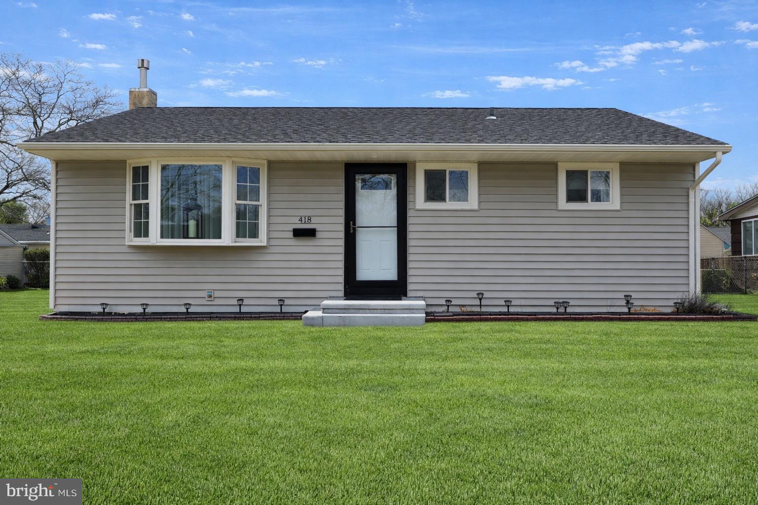 418 Perkins Lane Delanco, NJ 08075 - Photo 1 of 17 Charming home with lush green lawn.