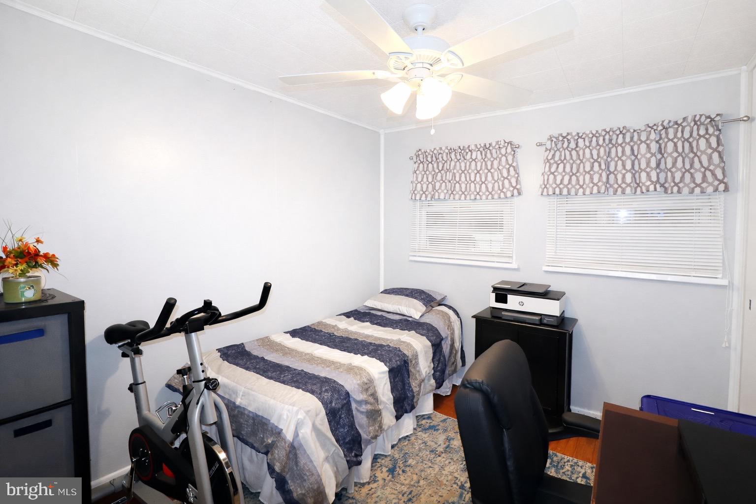 418 Perkins Lane Delanco, NJ 08075 - Photo 12 of 17 Cozy bedroom with modern touches.