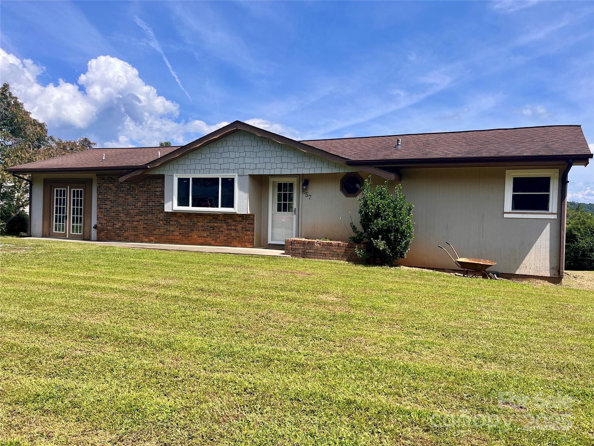 a house view with a garden space