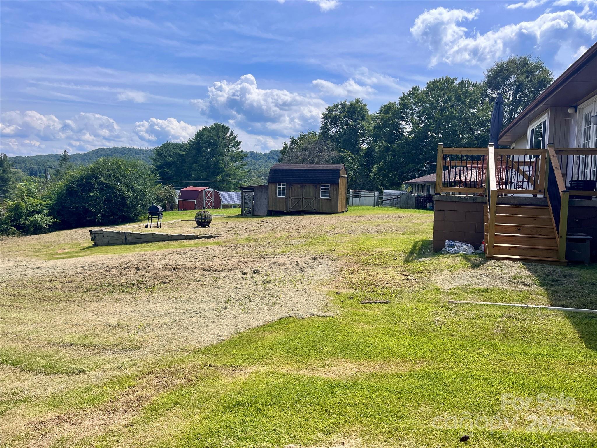 657 Arrowhead Trail Marion, NC 28752 - Photo 18 of 22 a swimming pool with trees in the background