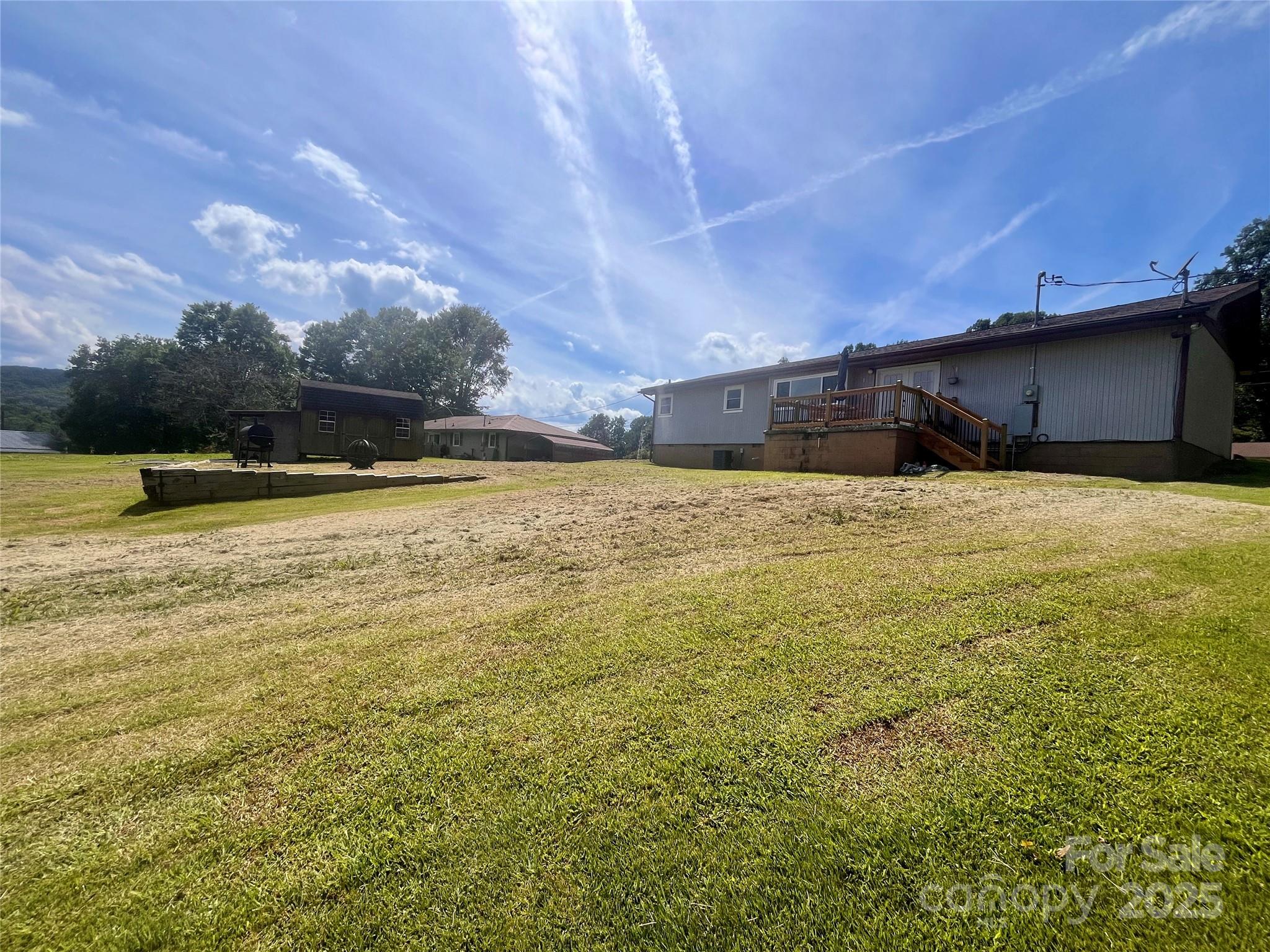 657 Arrowhead Trail Marion, NC 28752 - Photo 19 of 22 a swimming pool with an outdoor space and seating area