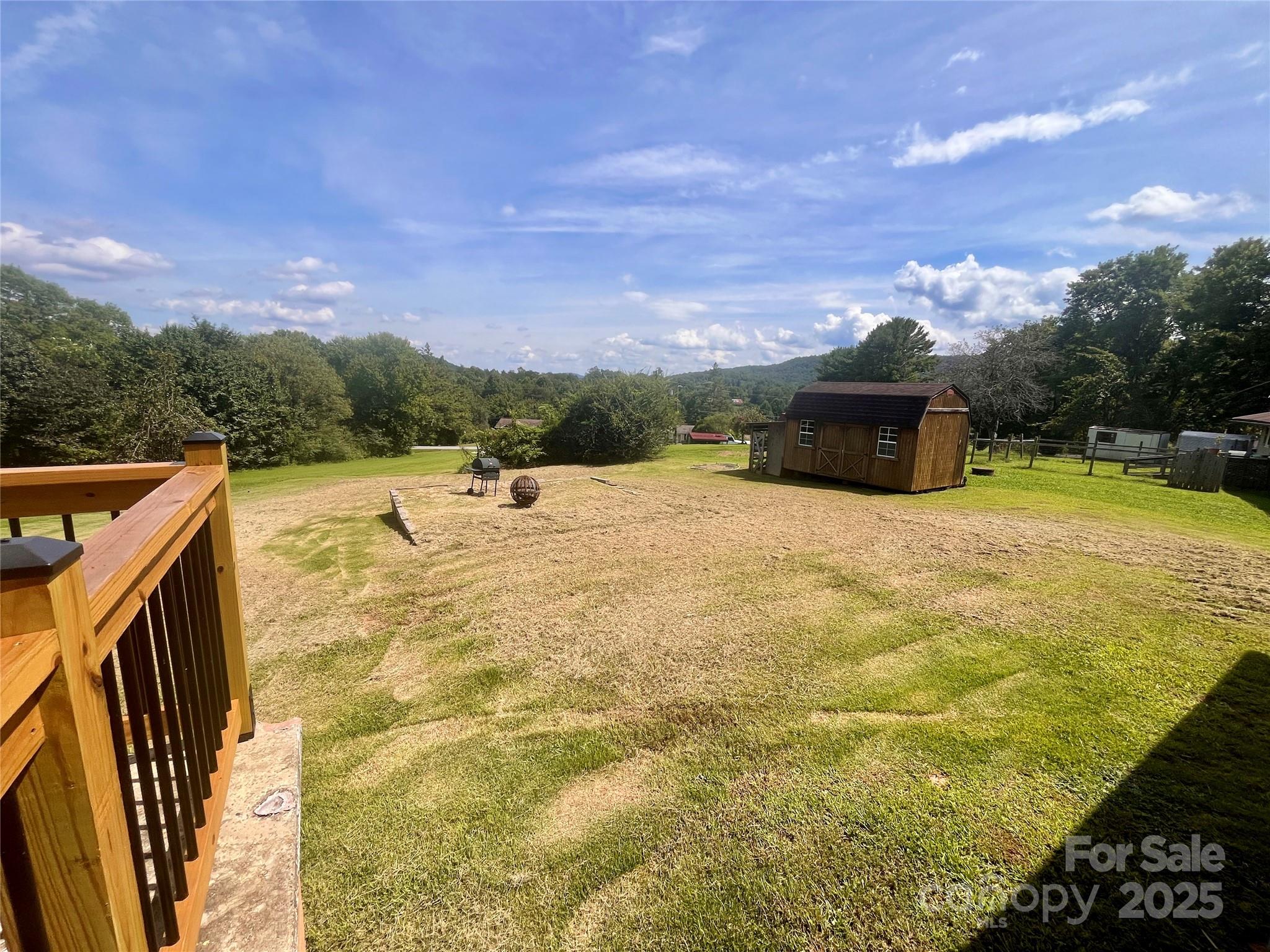 657 Arrowhead Trail Marion, NC 28752 - Photo 21 of 22 a view of swimming pool with lawn chairs and a yard