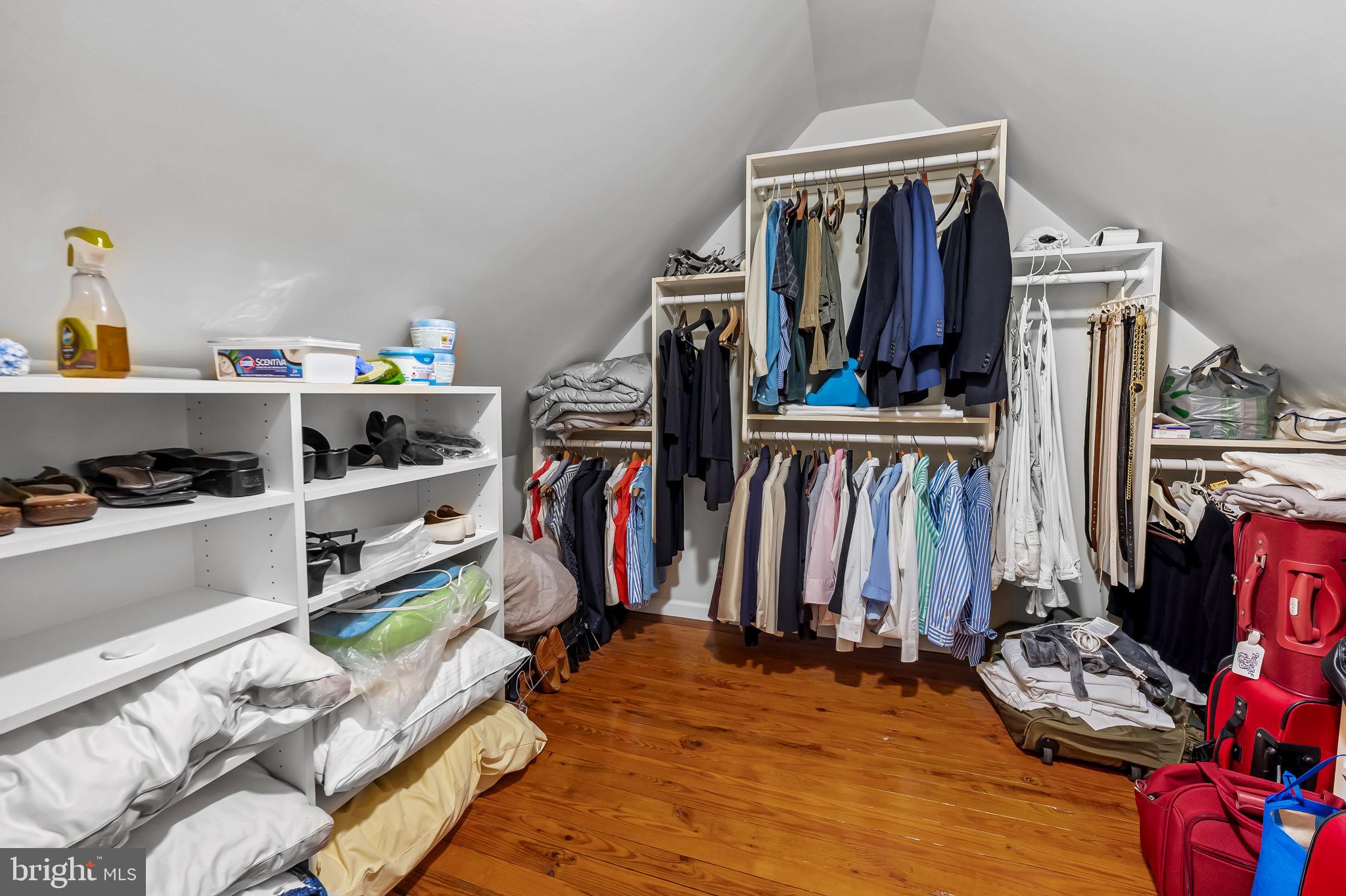 2115 Our Lane Stevenson, MD 21153 - Photo 25 of 48 a view of walk in closet with clothes and shoes