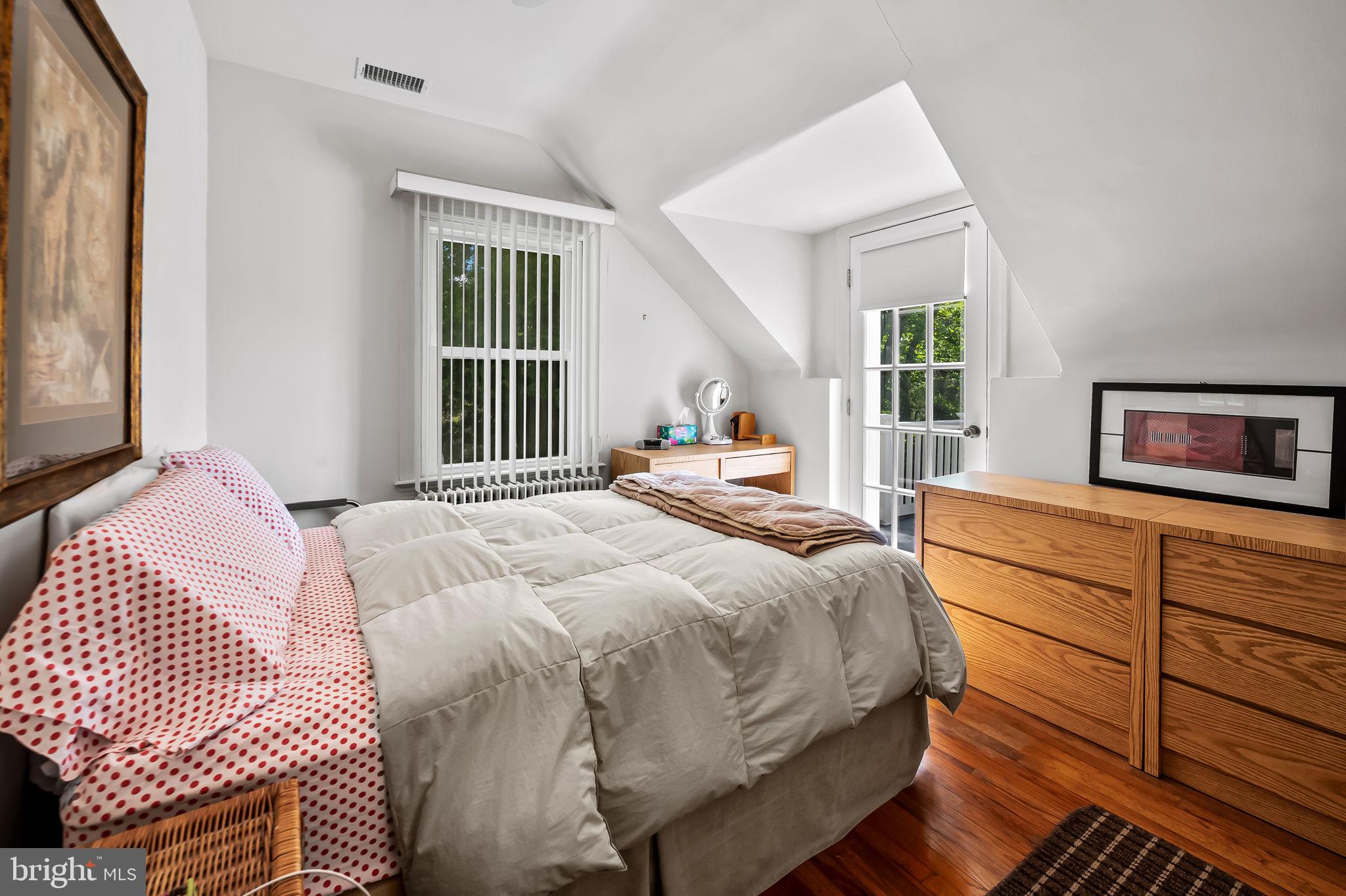 2115 Our Lane Stevenson, MD 21153 - Photo 26 of 48 a bedroom with a bed and wooden floor