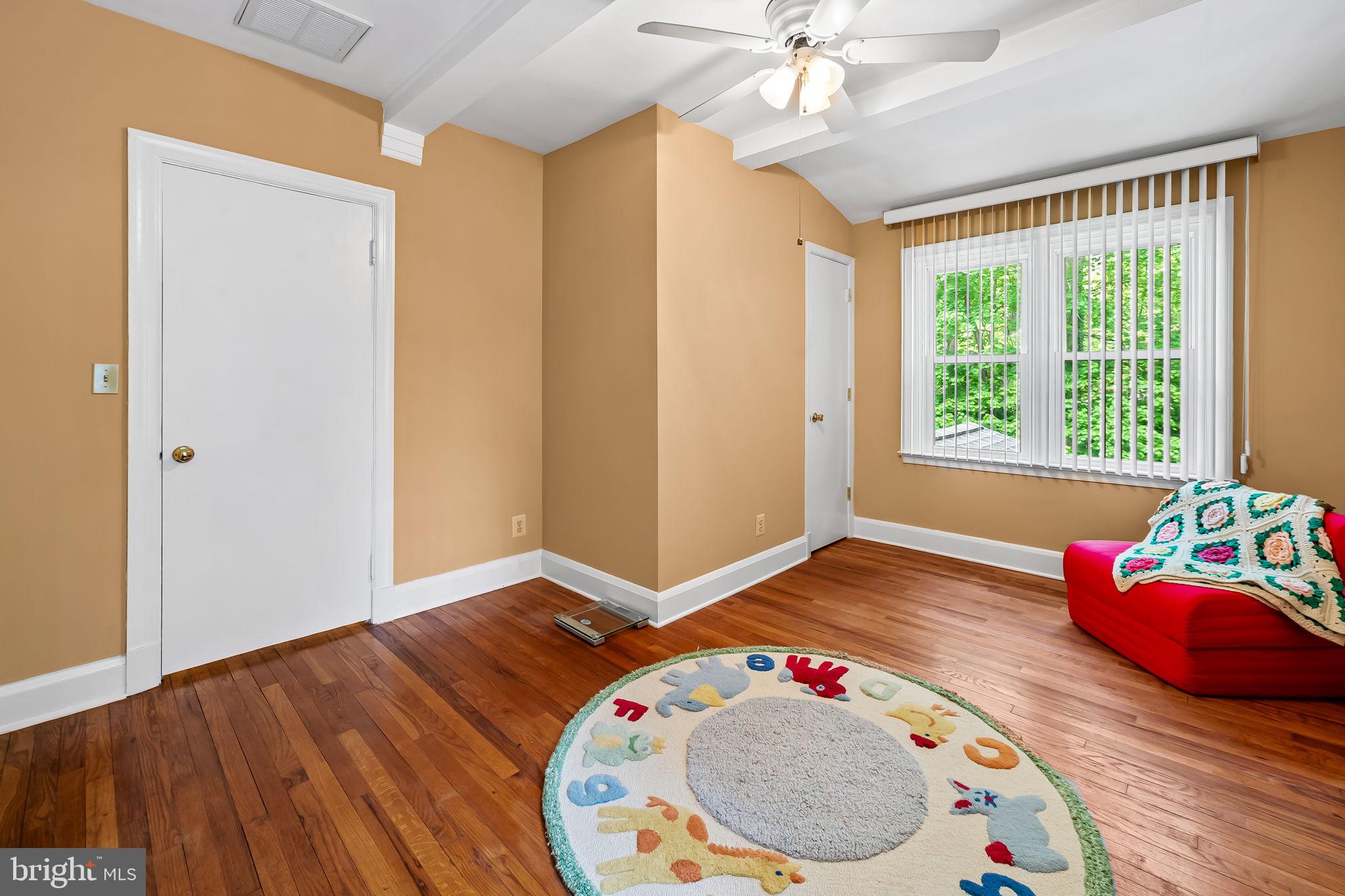 2115 Our Lane Stevenson, MD 21153 - Photo 31 of 48 a bedroom with a bed and a wooden floor