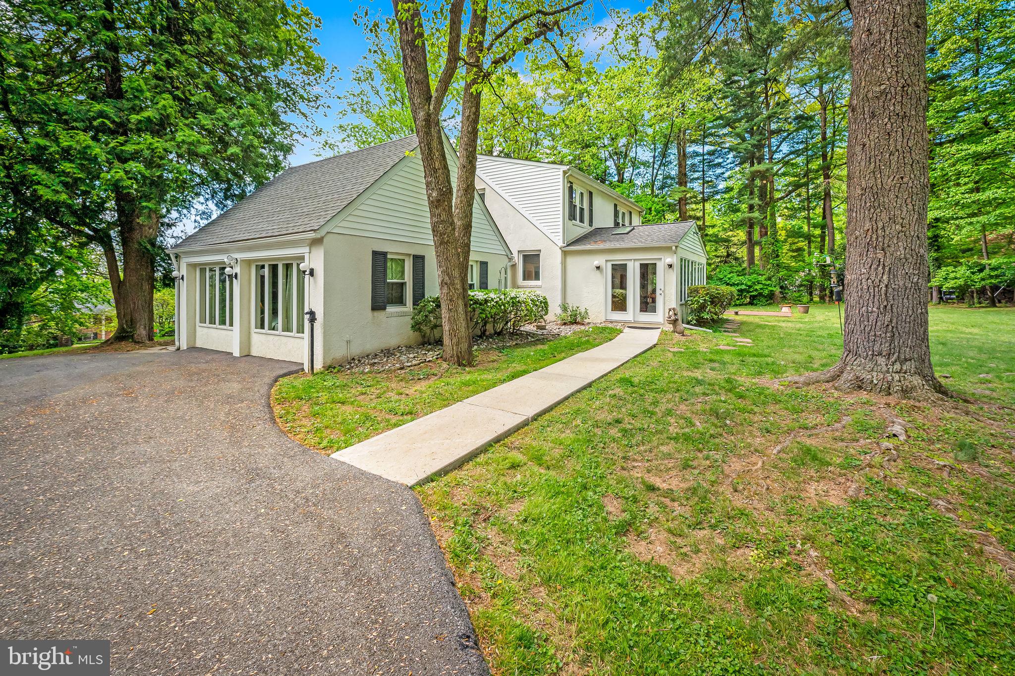 2115 Our Lane Stevenson, MD 21153 - Photo 4 of 48 front view of a house with a yard