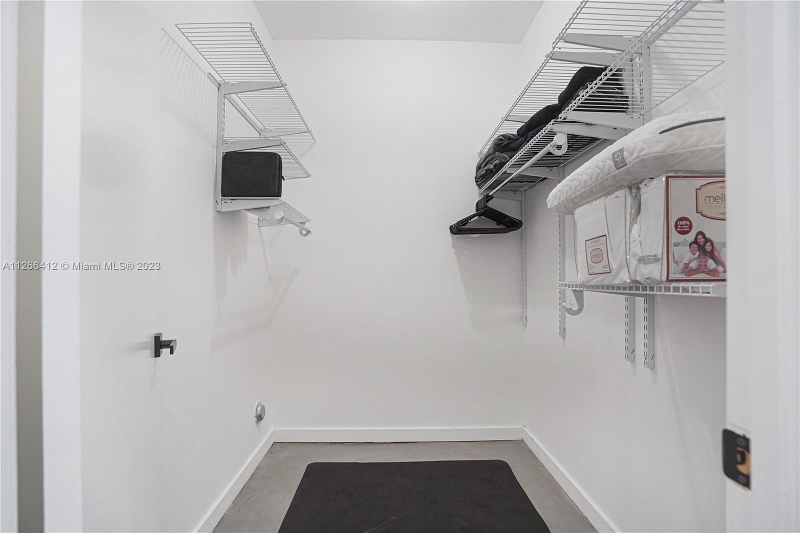 123 Southwest 17th Road, Unit 104 Miami, FL 33129 - Photo 25 of 34 a view of walk in closet
