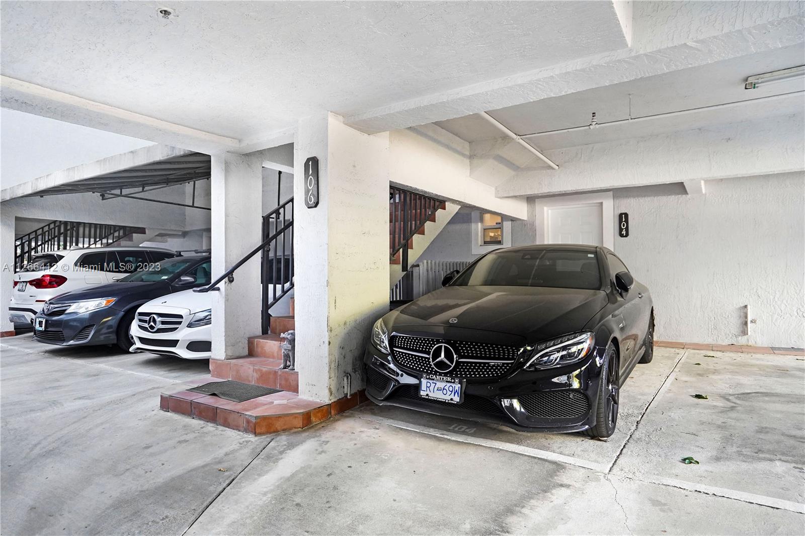 123 Southwest 17th Road, Unit 104 Miami, FL 33129 - Photo 33 of 34 a car parked in garage