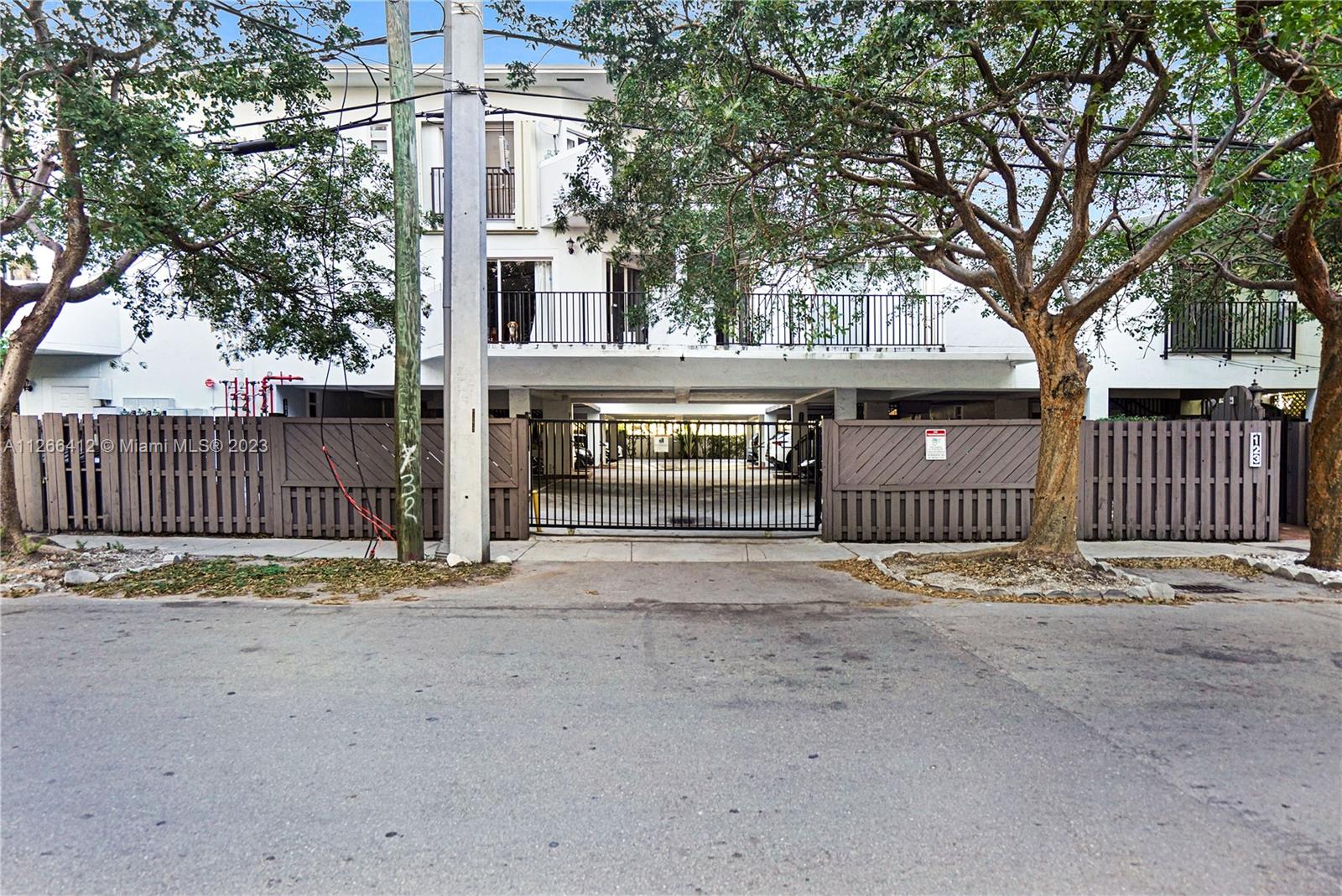 123 Southwest 17th Road, Unit 104 Miami, FL 33129 - Photo 34 of 34 front view of a house with a street