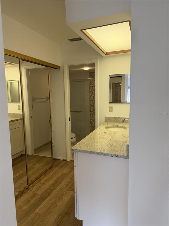 2004 Longpointe Circle Venice, FL 34293 - Photo 51 of 54 a bathroom with a granite countertop sink and a mirror