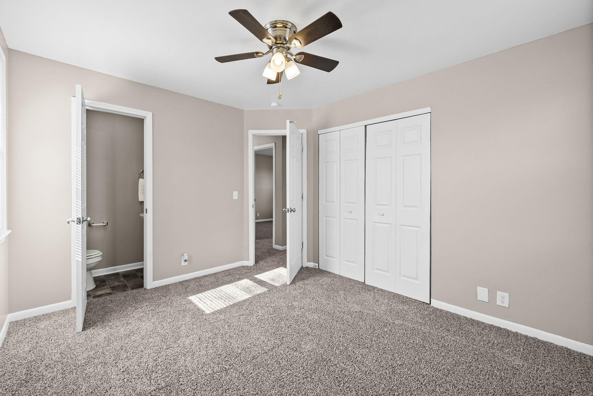 212 Jackson Road Clarksville, TN 37042 - Photo 16 of 32 an empty room with closet and a ceiling fan