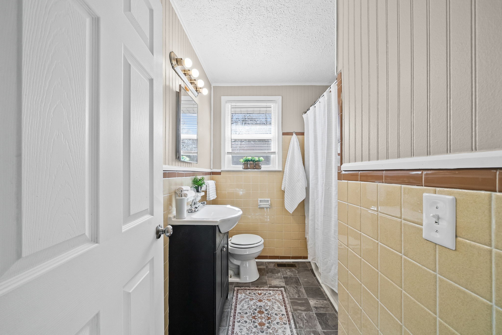 212 Jackson Road Clarksville, TN 37042 - Photo 20 of 32 a bathroom with a sink a toilet and shower curtain