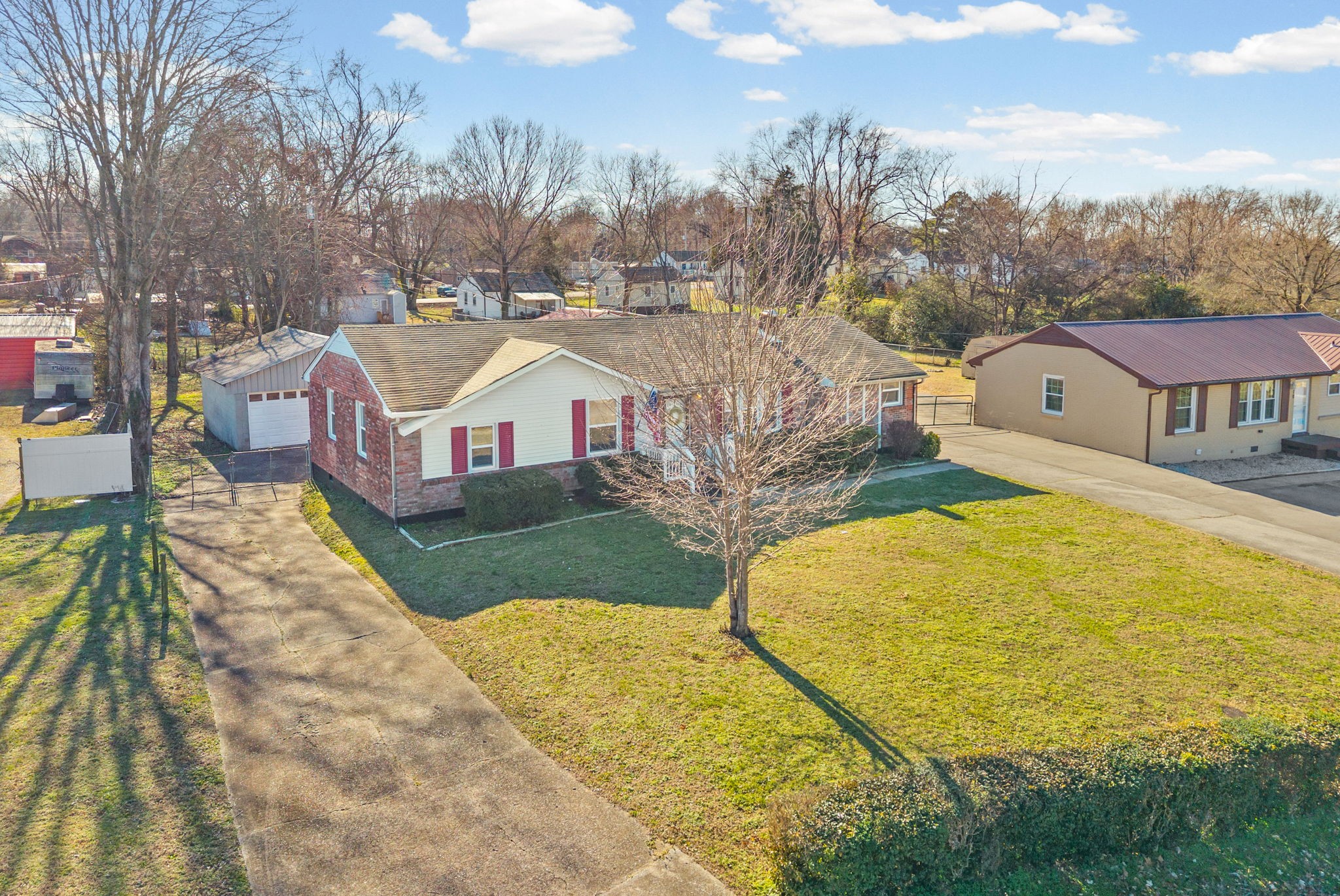 212 Jackson Road Clarksville, TN 37042 - Photo 3 of 32 a view of residential houses with yard and swimming pool