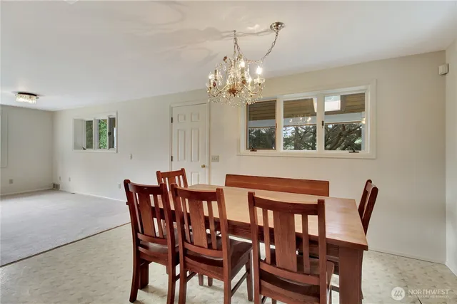 a view of a livingroom with furniture and a fireplace