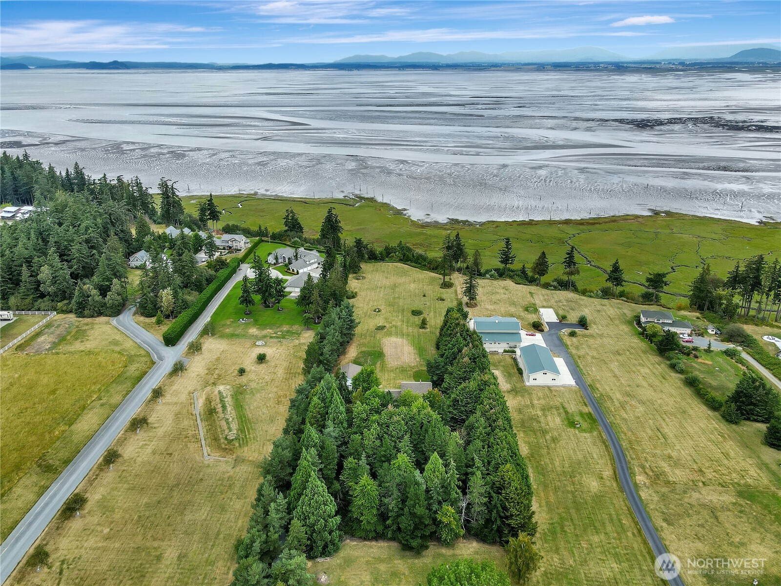 963 Utsalady Road Camano Island, WA 98282 - Photo 2 of 40 a view of a yard with an outdoor space