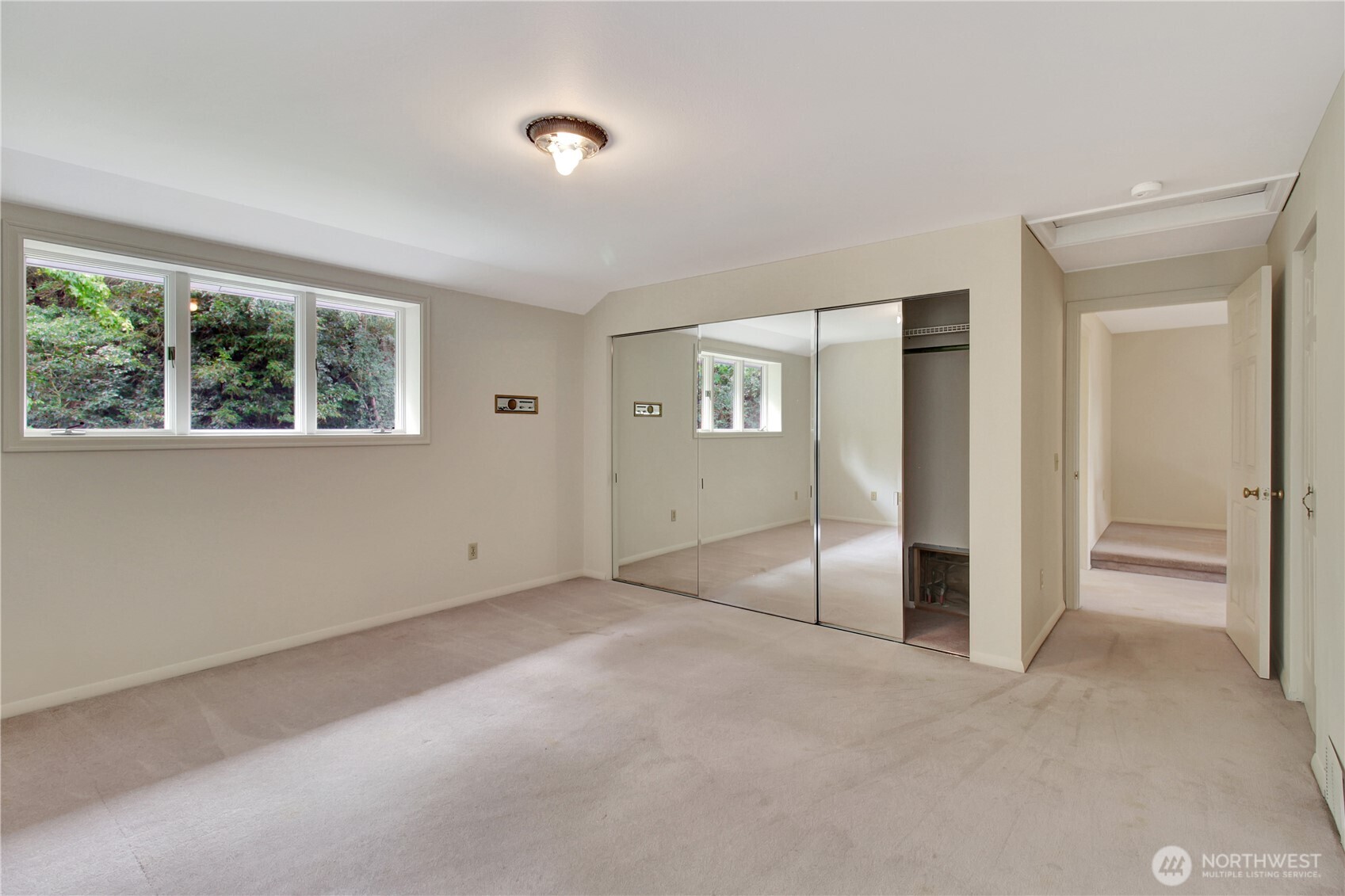963 Utsalady Road Camano Island, WA 98282 - Photo 23 of 40 an empty room with windows and closet