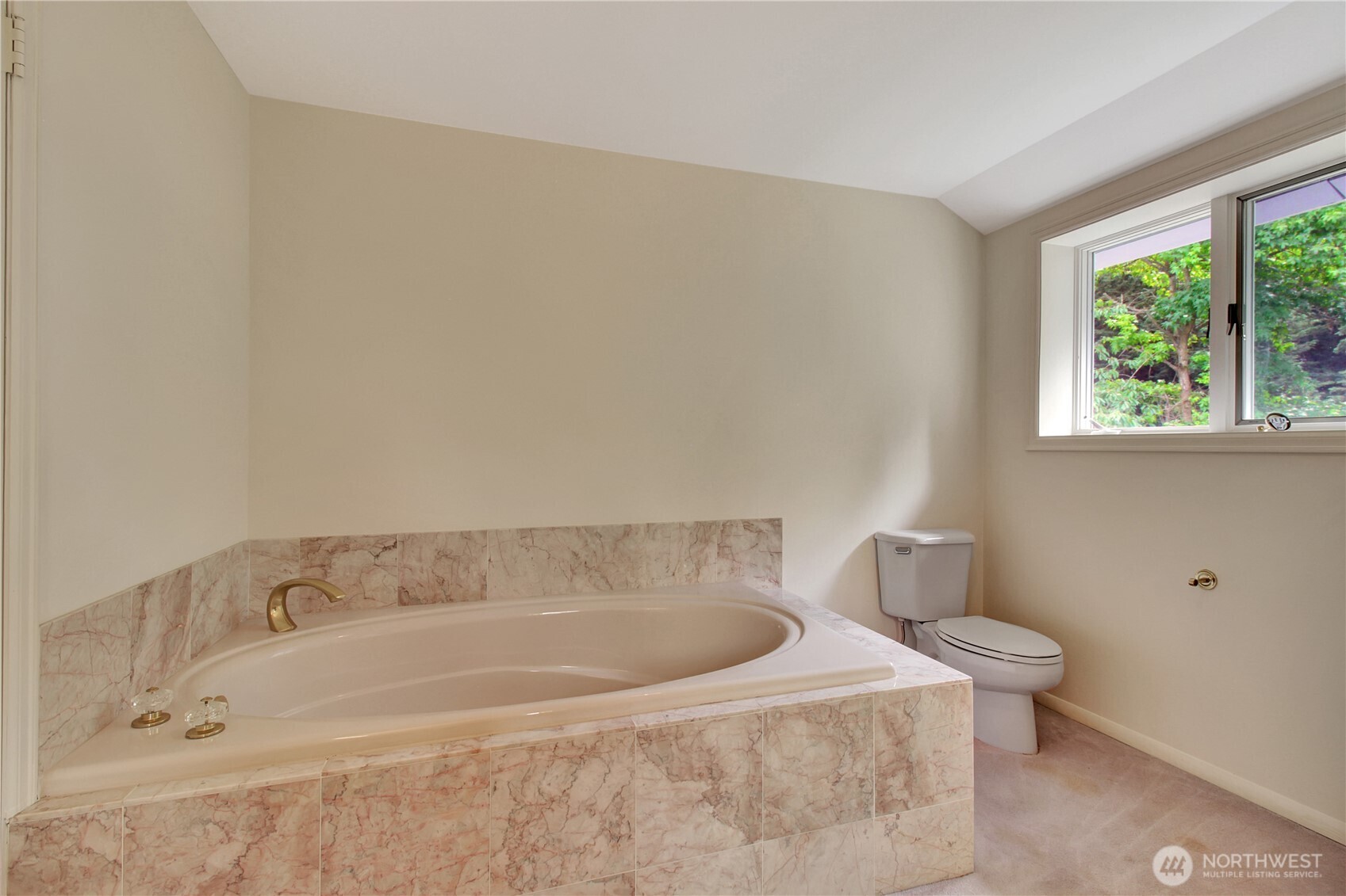 963 Utsalady Road Camano Island, WA 98282 - Photo 26 of 40 a white bath tub sitting next to a toilet