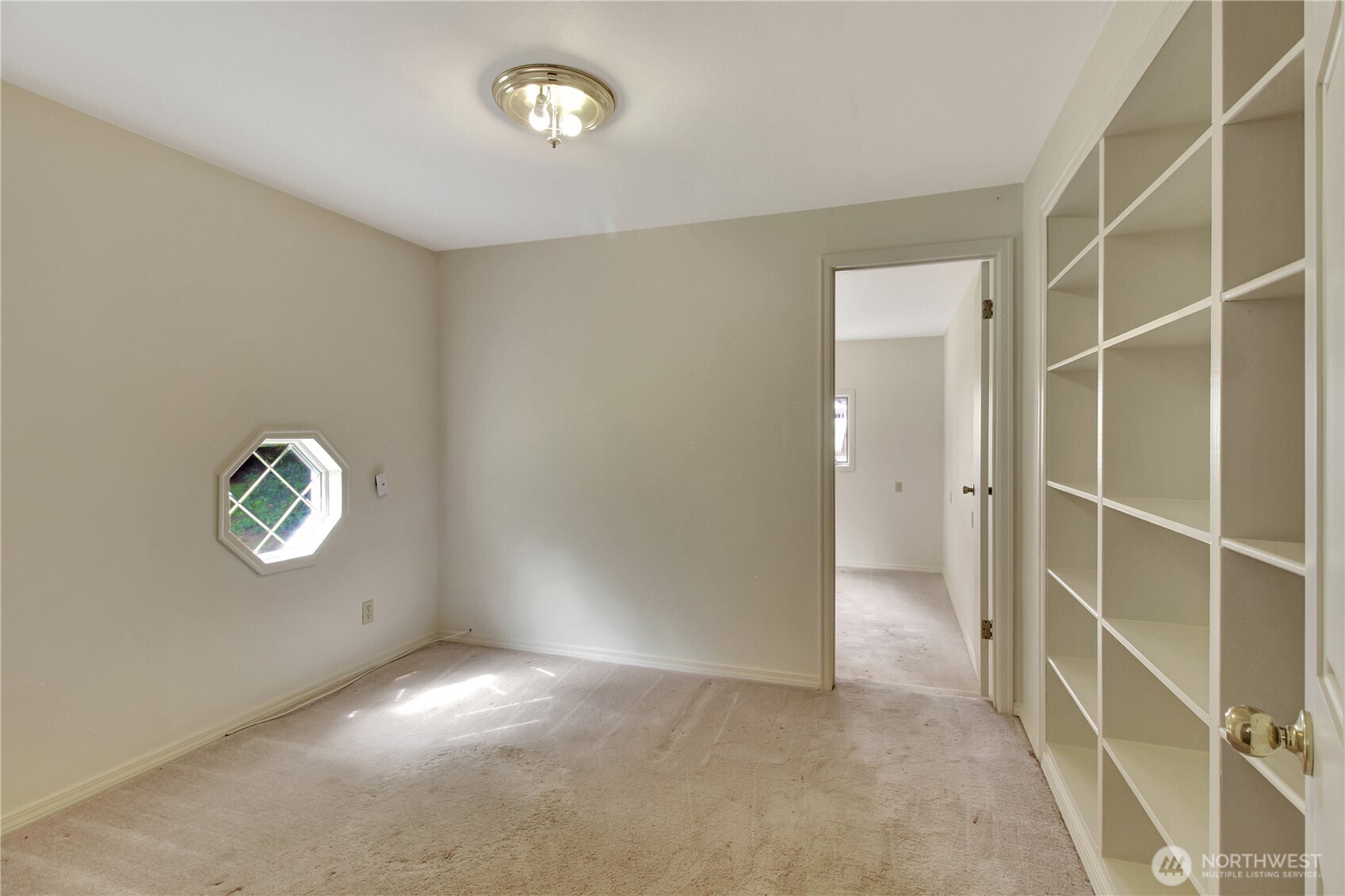 963 Utsalady Road Camano Island, WA 98282 - Photo 28 of 40 an empty room with windows