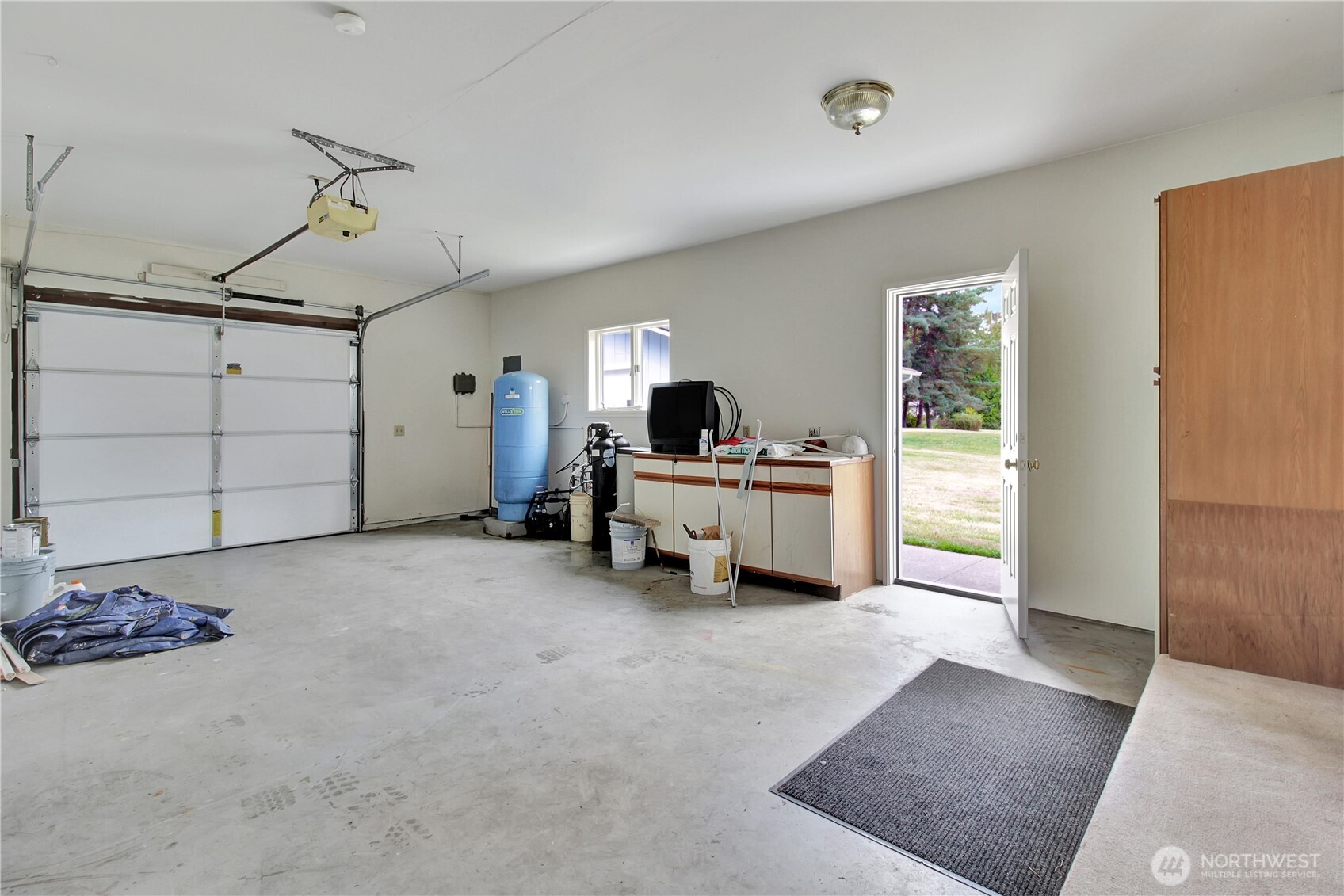 963 Utsalady Road Camano Island, WA 98282 - Photo 29 of 40 a view of a bedroom and utility room