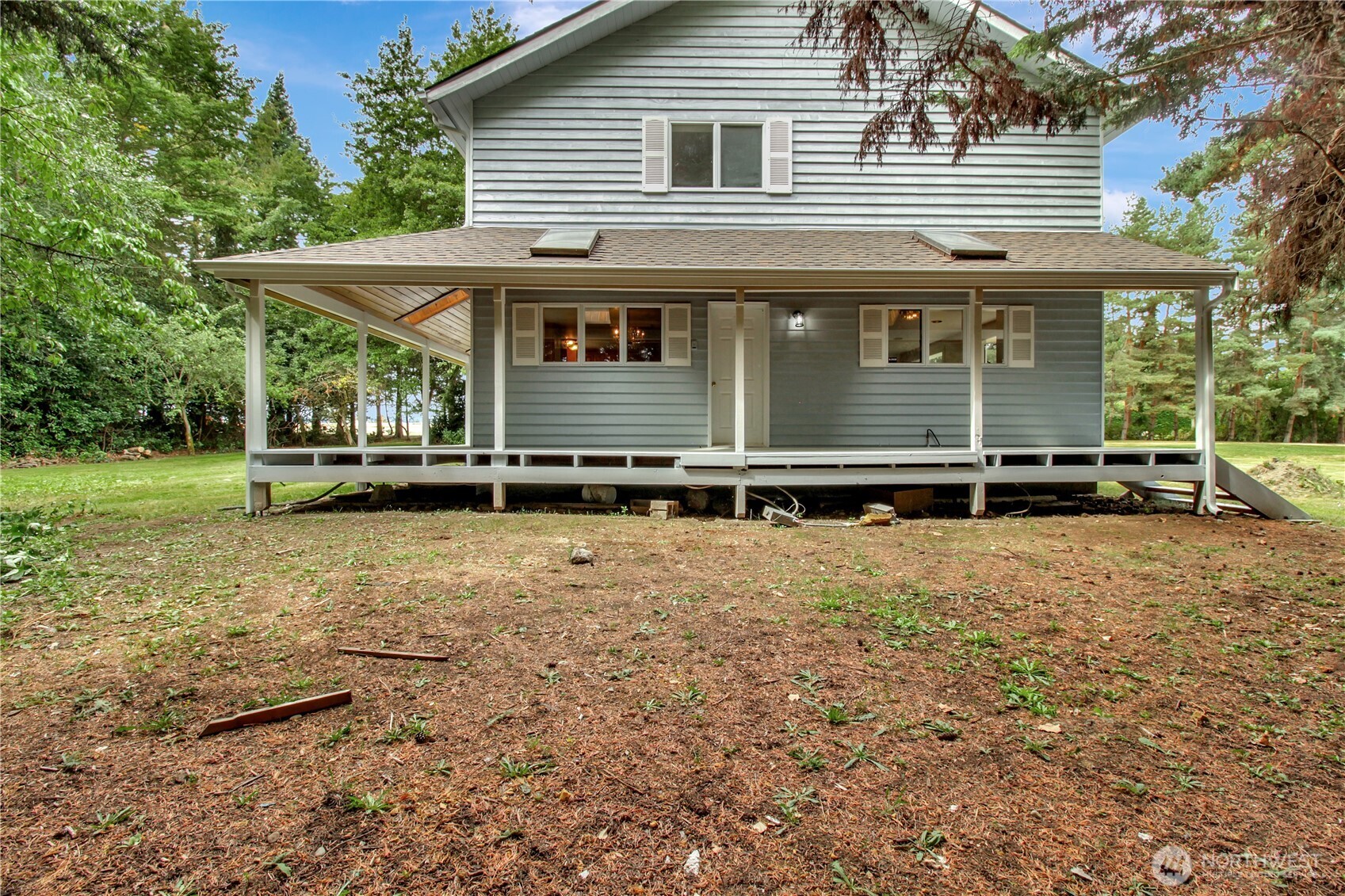 963 Utsalady Road Camano Island, WA 98282 - Photo 33 of 40 a front view of a house with a yard