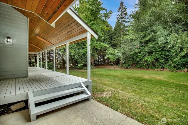 a house view with a backyard space