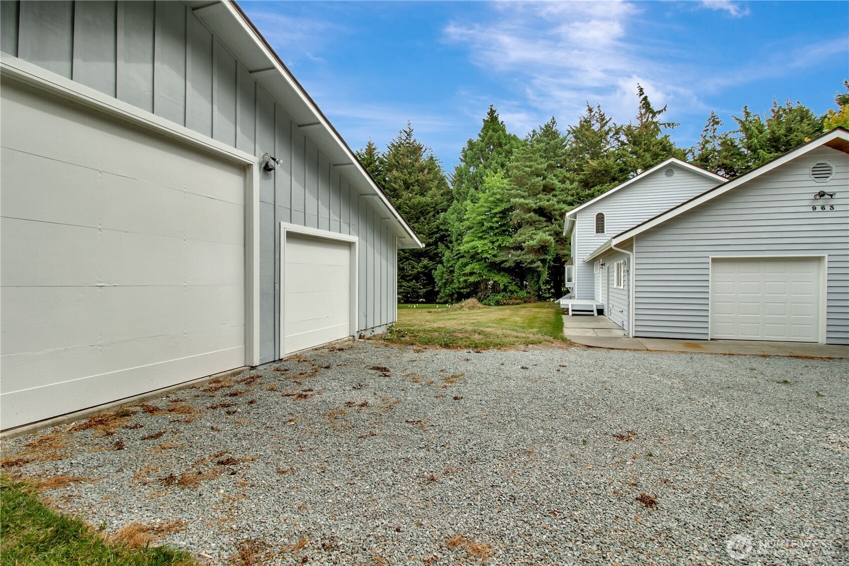 963 Utsalady Road Camano Island, WA 98282 - Photo 37 of 40 a view of a house with a backyard
