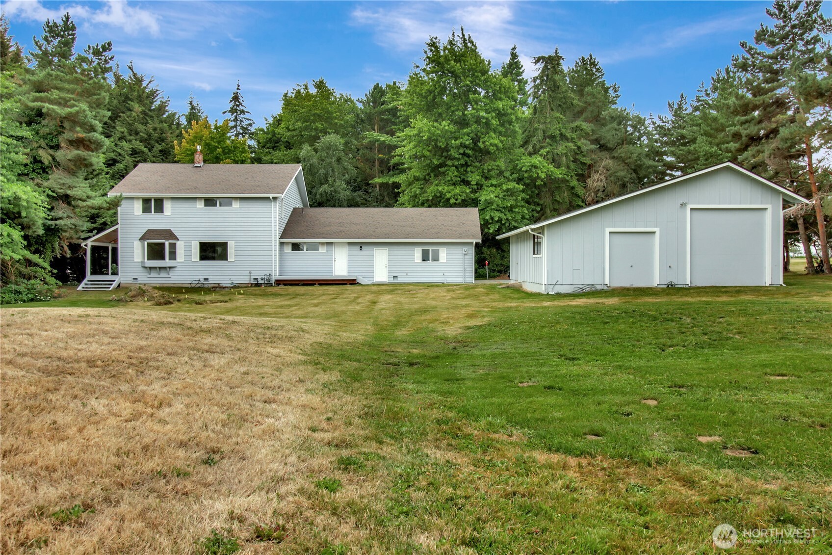 963 Utsalady Road Camano Island, WA 98282 - Photo 39 of 40 a view of a house with a yard