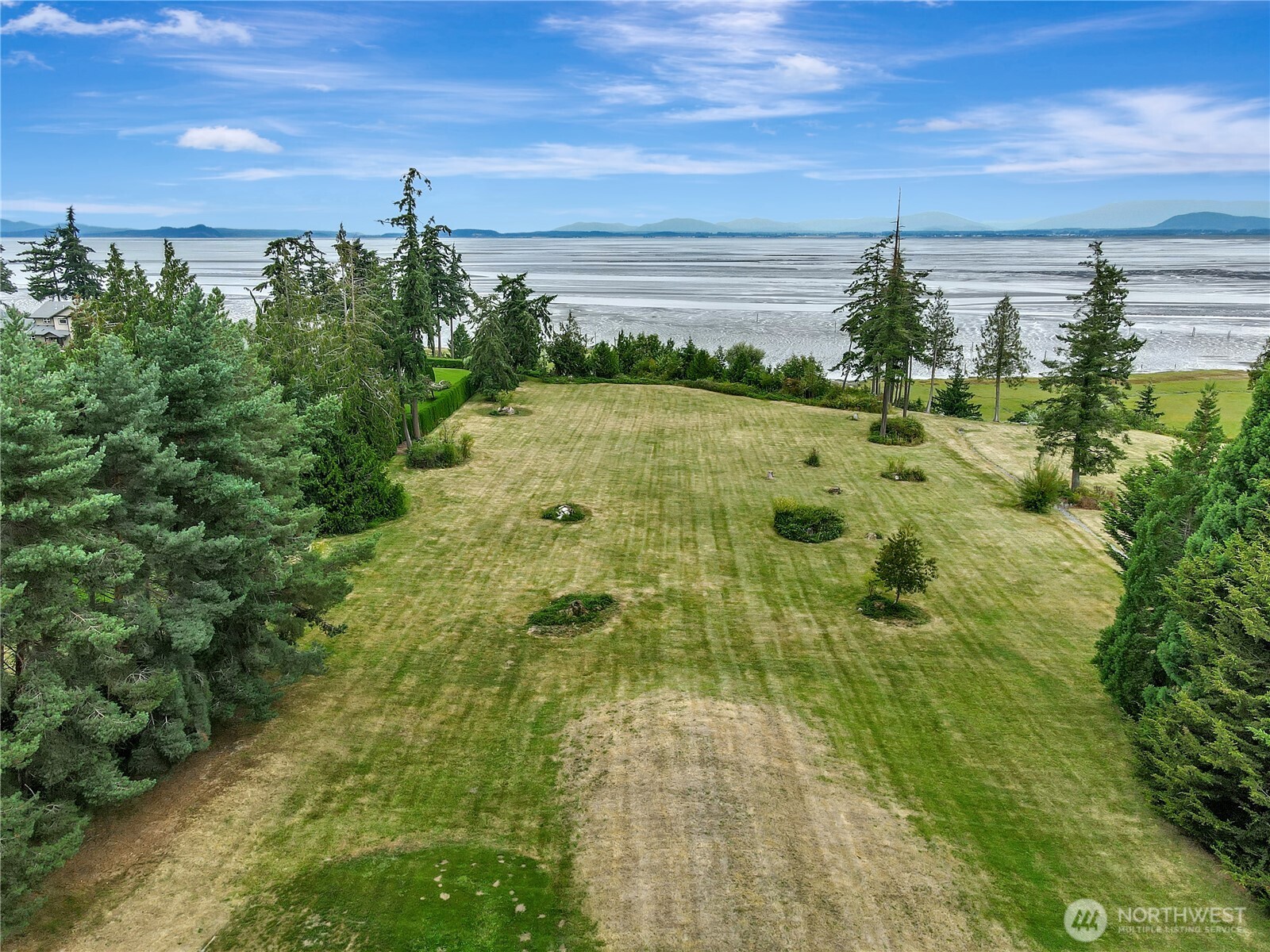 963 Utsalady Road Camano Island, WA 98282 - Photo 7 of 40 a view of a yard with an outdoor space