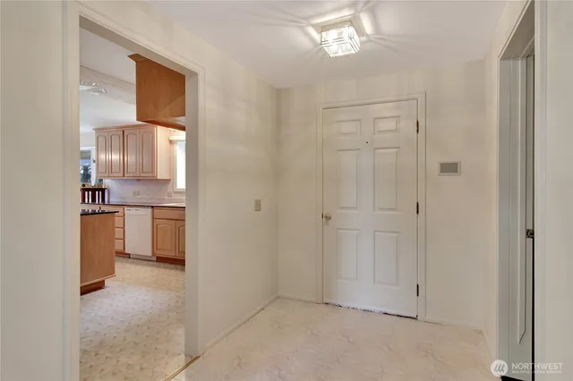 a kitchen with counter top space and sink