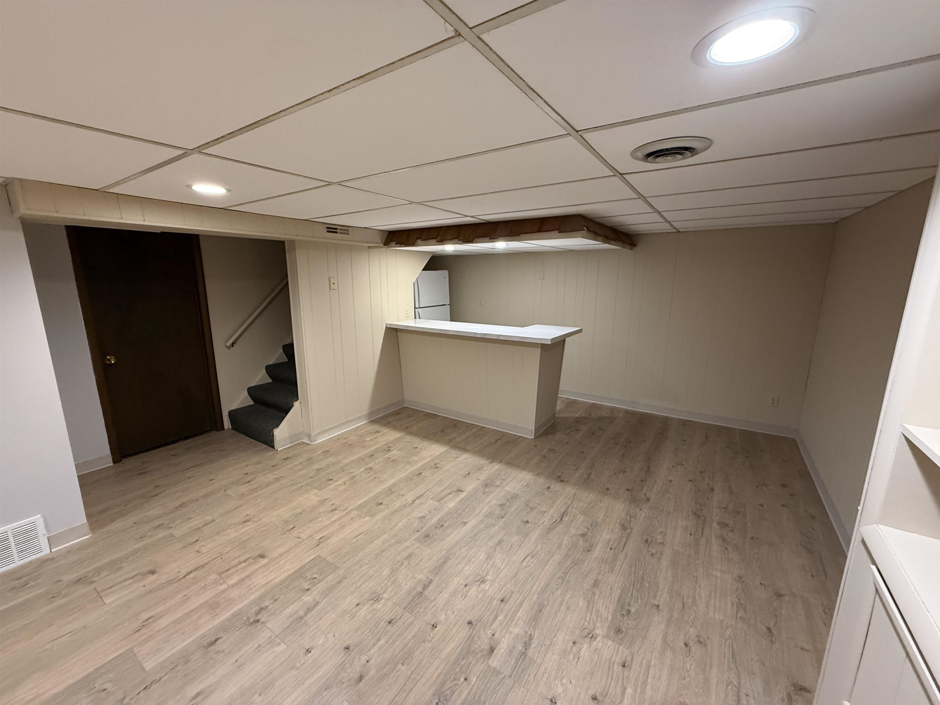 4524 Newcastle Road Rockford, IL 61108 - Photo 14 of 24 a view of empty room with wooden floor